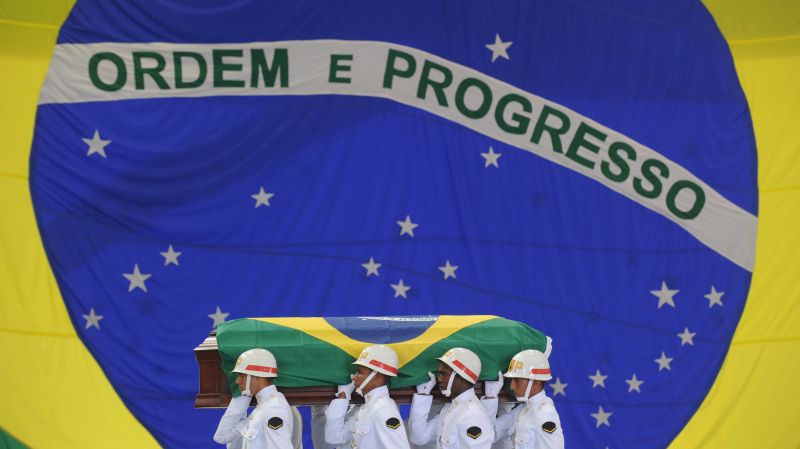 Caixões foram cobertos com a bandeira do Brasil | Antonio Scorza/AFP