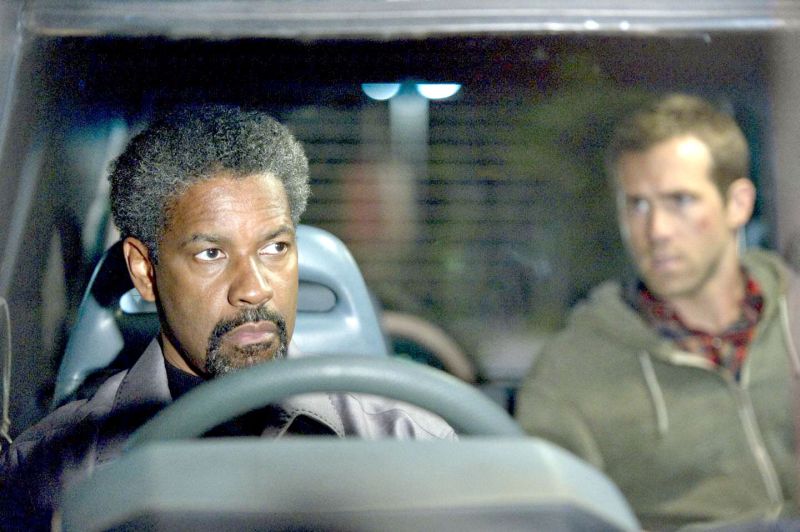 Em Protegendo o Inimigo, Washington e Reynolds são agentes da CIA que protagonizam perseguições pelas ruas da África do Sul | Divulgação