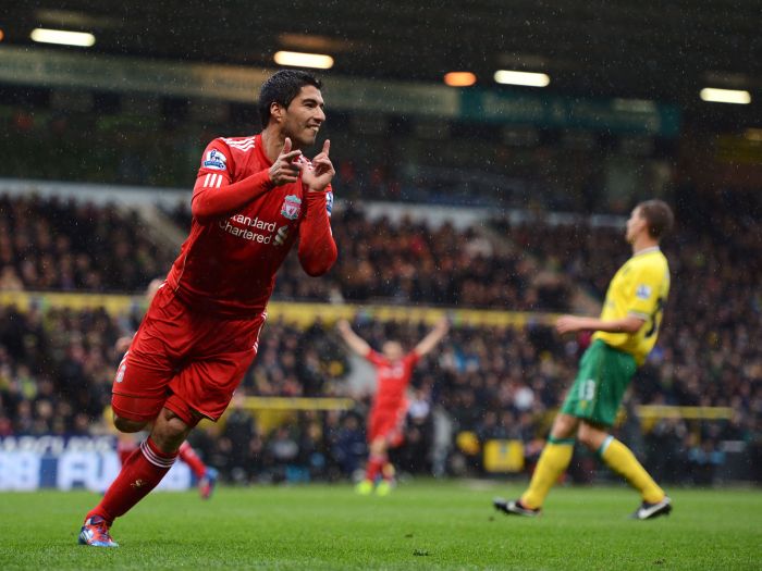 Suárez comemoraa o primeiro gol do Liverpool diante do Norwich | AFP