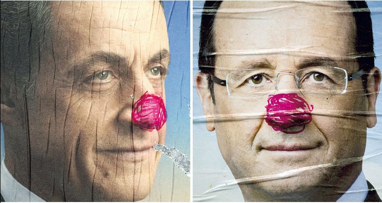 Cartazes de campanha de Sarkozy e Hollande, ambos com narizes de palhaço pintados à caneta | Fotos: Joel Saget/AFP