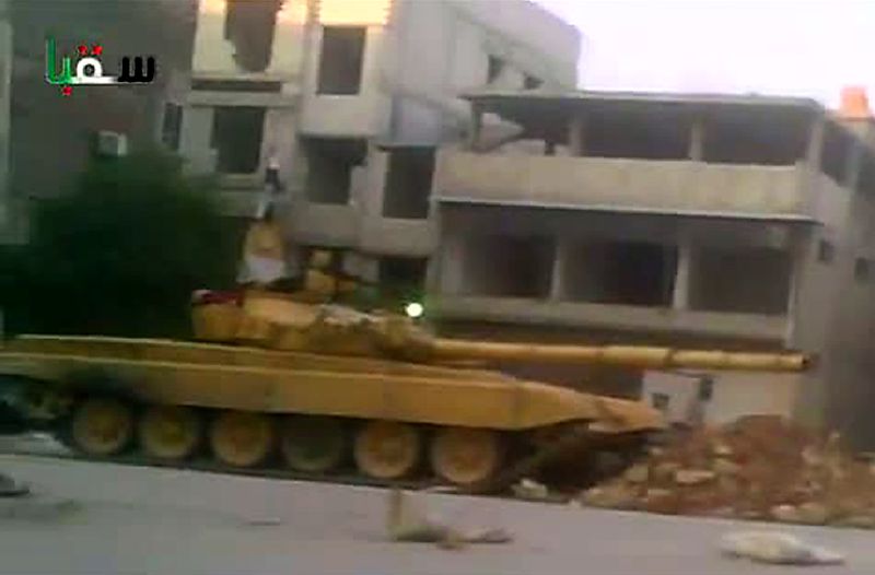 Imagens de vídeo mostra forças sírias invadem cidades e vilarejos do país | AFP PHOTO/YOUTUBE