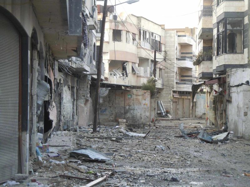 Prédios destruídos em Homs, palco de combates entre forças do governo sírio e rebeldes | Zaman Al Wasel/Reuters