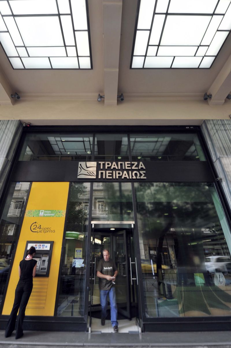 Agência do banco grego Piraeus: incertezas continuam | Aris Messinis /AFP