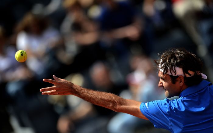O suíço Roger Federer não teve muitas dificuldades para bater o argentino Carlos Berlocq na estreia no saibro de Roma | Filippo Monteforte/AFP