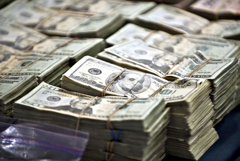 Notas de dólar: moeda subiu 1% na semana | Ronal Schemidt/AFP