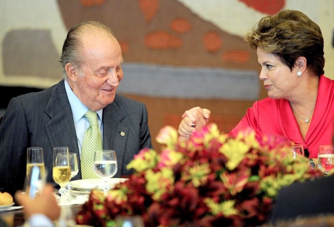 Juan Carlos disse a Dilma que brasileiros são muito bem vindos | Juan Pedro Ladeira / AFP