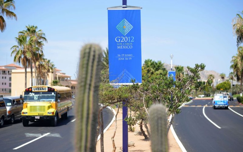Banner anuncia realização da Cúpula do G-20 em Los cabos, no México | AFP PHOTO / BERTRAND LANGLOIS