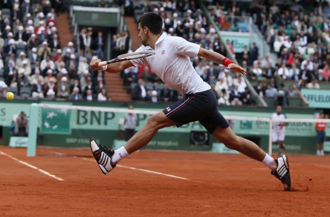 Novak Djokovic conseguiu salvar quatro match points diante de Jo-Wilfried Tsonga e venceu a partida | AFP
