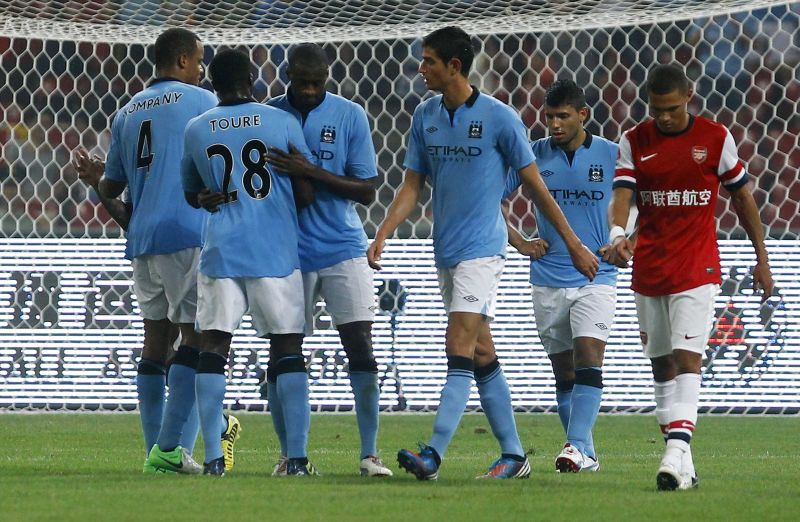 Jogadores do Manchester City comemoram a vitória sobre o Arsenal em amistoso | Reuters