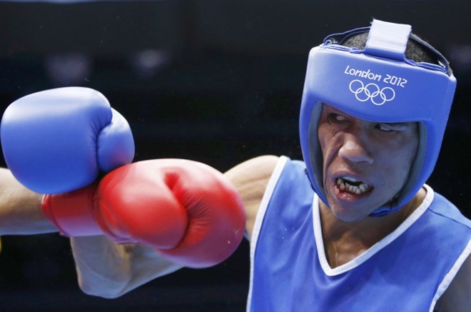 Colombiano Eduar Marriaga Campo se esquiva de soco na eliminatória do boxe |