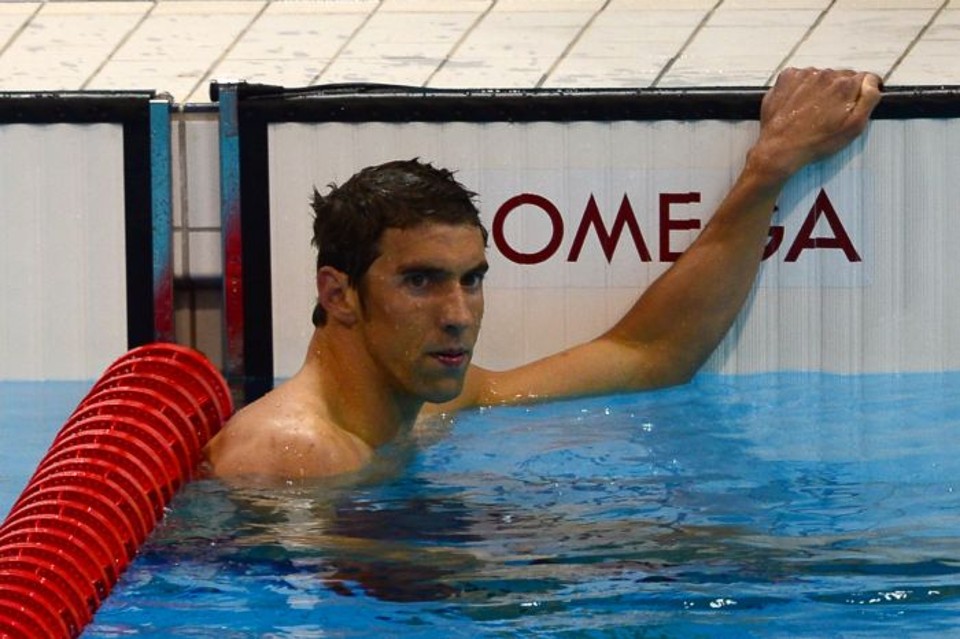 Visivelmente decepcionado, Michael Phelps amargou a quarta colocação nos 400 medley | Christophe Simon/AFP