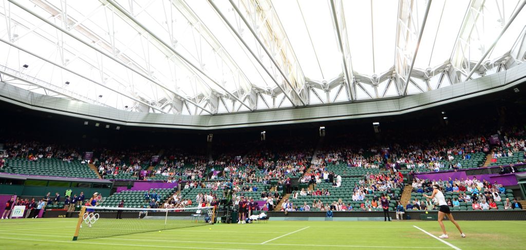 O local era o principal ginásio do All England Club e em quadra estava a número 2 do mundo, Agnieska Radwanska, mas nem assim a arquibancada ficou lotada | Martin Bernetti/ AFP