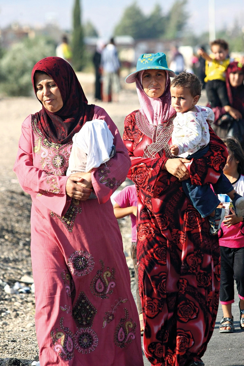 Temor de armas químicas eleva o número de pessoas que fogem da Síria para países vizinhos | Adem Altan/AFP