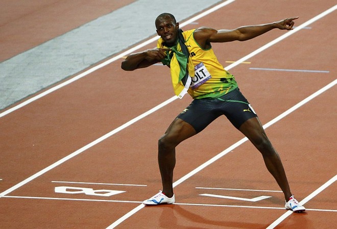 Bolt faz sua tradicional comemoração na pista do Estádio Olímpico | 