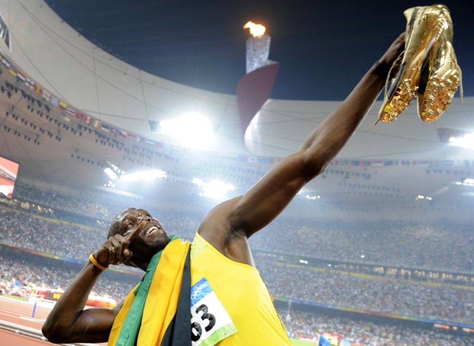 Usain Bolt em seu tradicional gesto | AFP