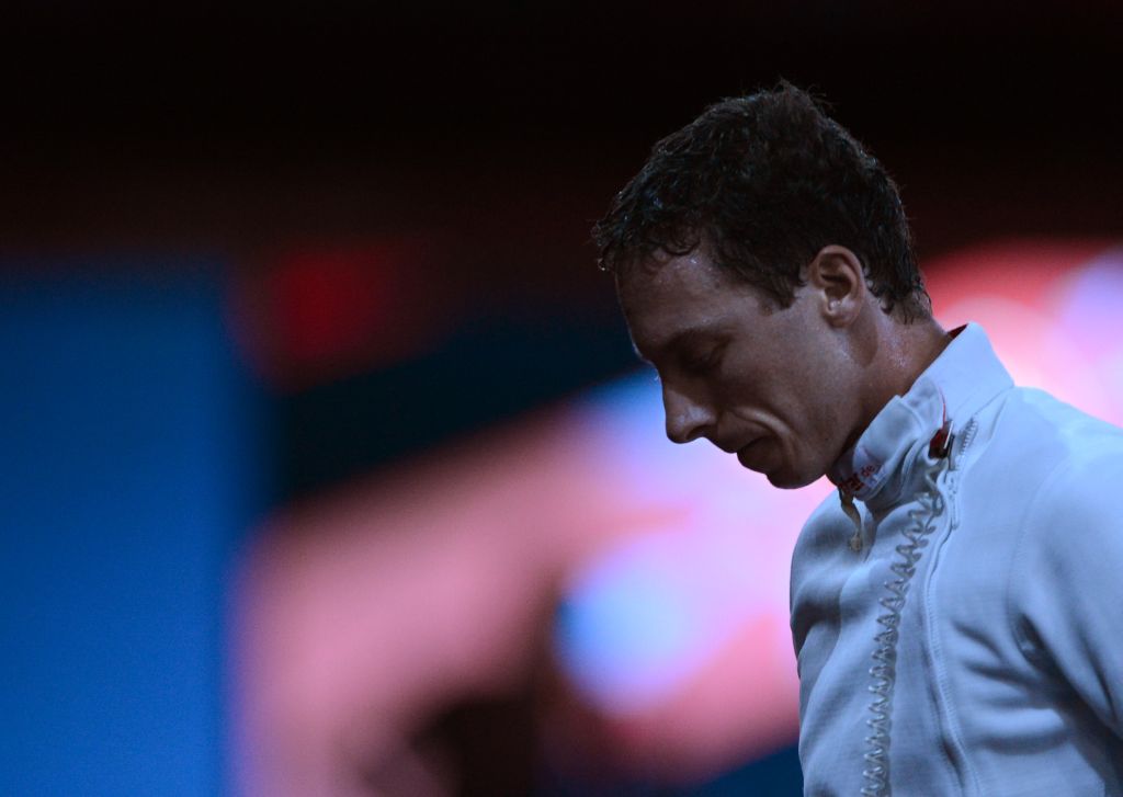 Athos Schwantes deixa o tablado abatido pela derrota | Toshifumi Kitamura/ AFP