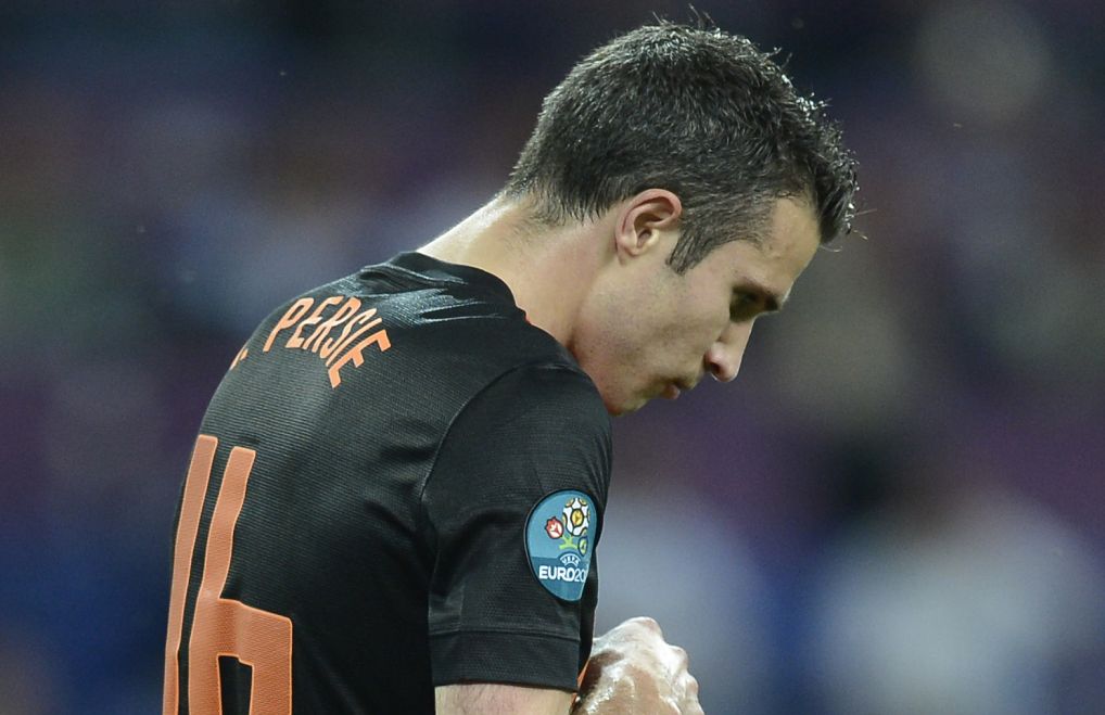 Van Persie, do rival Arsenal, está na mira do United | Filippo Monteforte/ AFP