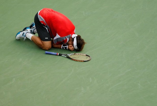 Emocionado, David Ferrer comemora a classificação para as semifinais do US Open | Mike Stobe / AFP