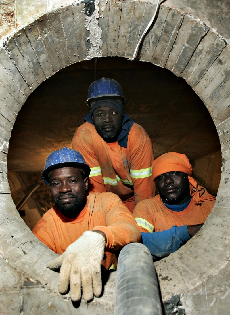 Jean Auguste, Jean Vertus e Kesnel (no sentido horário) trabalham em Ponta Grossa: frio, saudade e idioma são barreiras na adaptação dos haitianos | Josué Teixeira/Gazeta do Povo