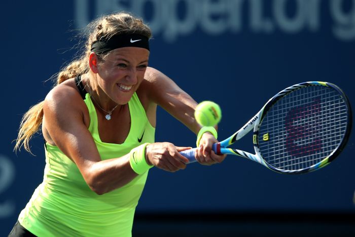 A bielorussa Victoria Azarenka garantiu vaga na final após derrotar Sharapova por 2 a 1 | Clive Brunskill/AFP