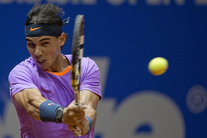 Nadal em partida do Aberto de Wimbledon, em junho, sua última competição antes da lesão que o tirou das quadras | AFP