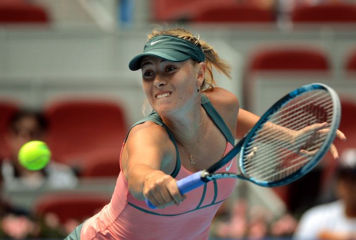 Maria Sharapova não teve dificuldades contra a eslovena Polona Hercog em Pequim | Mark Ralston / AFP