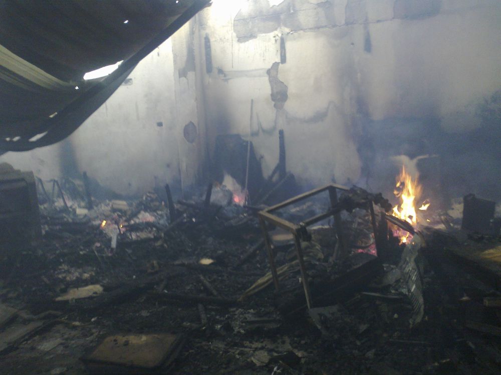 Foto divulgada pelos rebeldes mostra um prédio destruído em Damasco | Reuters/Bassam Al-Erbeeni/Shaam News Network/Divulgação