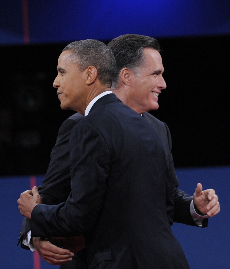 Barack Obama e Mitt Romney durante o último debate da campanha presidencial, na Flórida | Saul Loeb/AFP