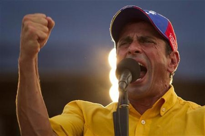 O jovem candidato luta para derrotar Chávez, no poder há 14 anos | Reuters