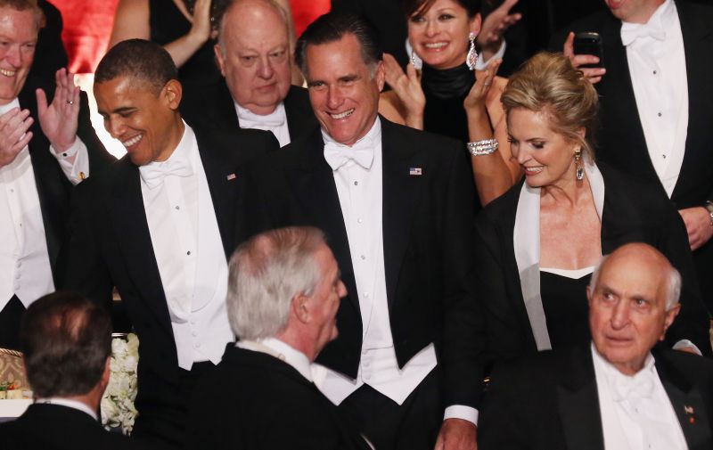 Obama com Romney e Ann Romney durante jantar em Nova York | Mario Tama/ AFP
