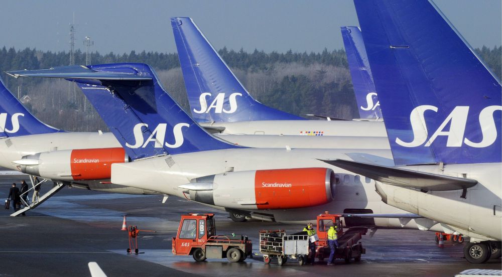 Aviões da companhia SAS são vistos no aeroporto Arlanda, que fica ao norte de Estocolmo | Reuters/Johan Nilsson/SCANPIX