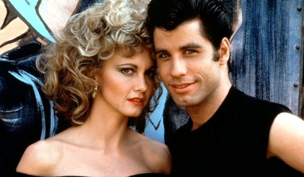 John Travolta e a cantora Olivia Newton-John em Grease | Divulgação