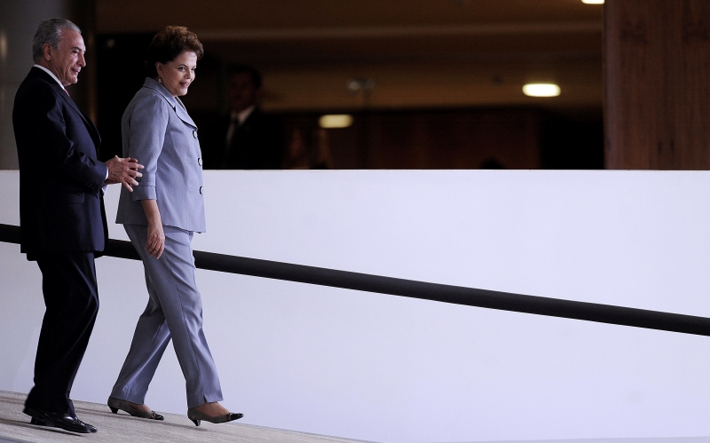 Temer e Dilma: expectativa é que o discurso de hoje da presidente indique que os dois estarão juntos em 2014 | Evaristo Sá/AFP