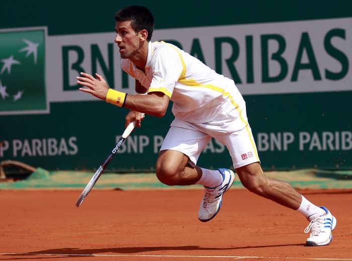 Novak Djokovic bateu Mikhail Youzhny de virada em Mônaco nesta quarta-feira | Eric Gaillard / Reuters