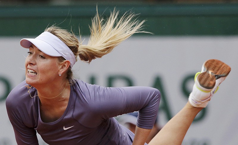 Sharapova teve de esperar duas interrupções acabarem para vencer e ir à 3ª Rodada de Roland Garros | Philippe Wojazer / Reuters