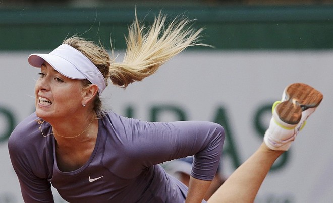 Sharapova teve de esperar duas interrupções acabarem para vencer e ir à 3ª Rodada de Roland Garros | Philippe Wojazer / Reuters