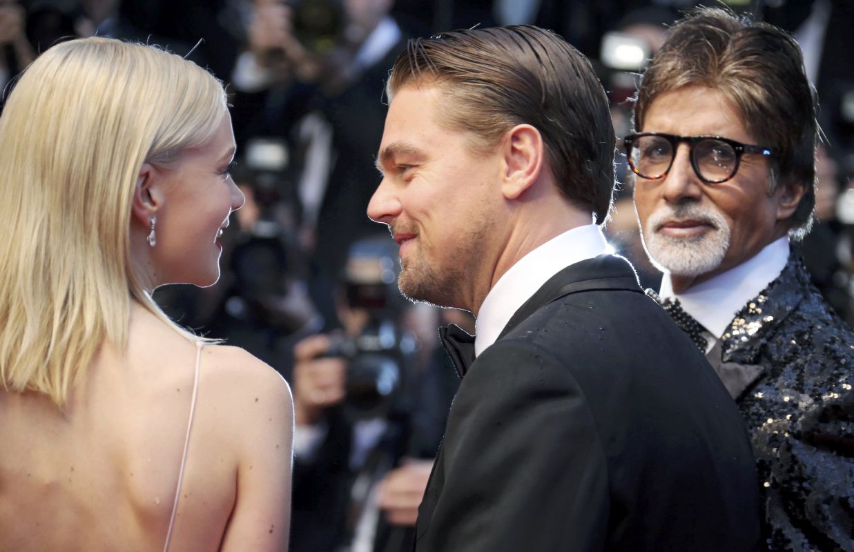 Carey Mulligan (à esquerda), Leonardo DiCaprio e Amitabh Bachchan no Festival de Cannes | Regis Duvignau/Reuters