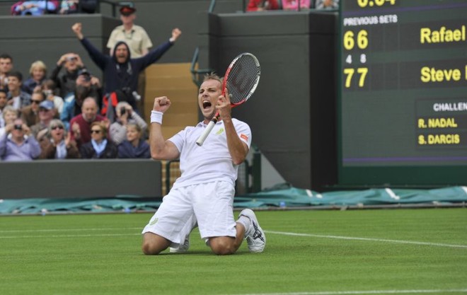 Belga Steve Darcis comemora a surpreendente vitória diante de Nadal | 