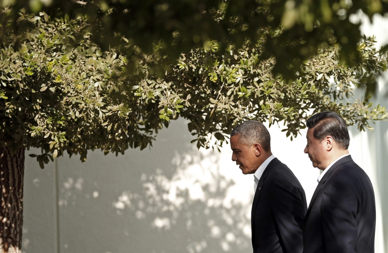 Os presidentes Barack Obama e Xi Jinping chegam para reunião no Rancho Mirage, Califórnia | Kevin Lamarque/Reuters