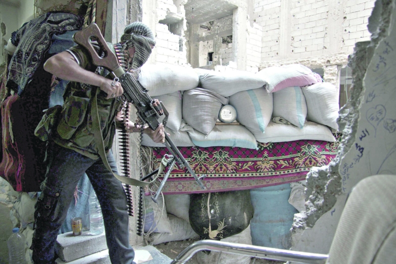 EUA: armas aos rebeldes | Khalil Ashawi /Reuters