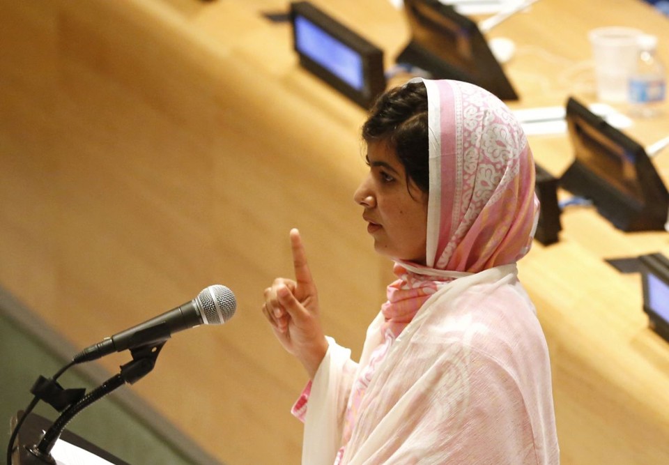 "Vamos pegar nossos livros e canetas", disse Malala. "Eles são nossas armas mais poderosas" | Reuters/Brendan McDermid