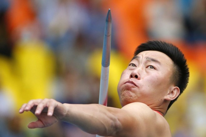 O chinês Zhao Qinggang durante a prova de lançamento de dardo | 