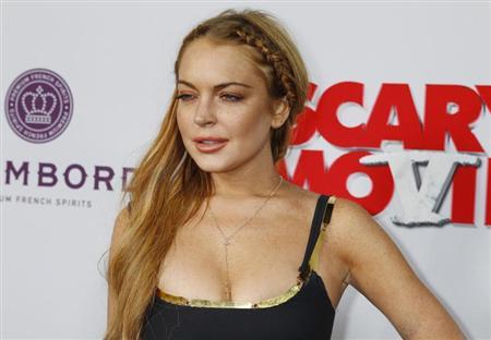 Atriz Lindsay Lohan ao chegar à estreia do filme "Todo Mundo em Pânico 5", em Hollywood | REUTERS/Fred Prouser