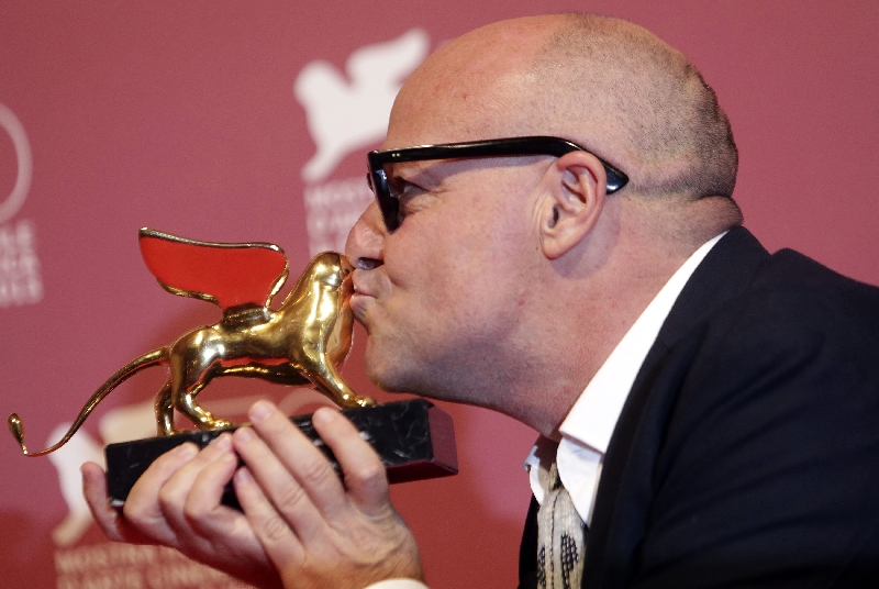 Gianfranco Rosi ficou surpreso com a vitória | Manuel Silvestri/Reuters