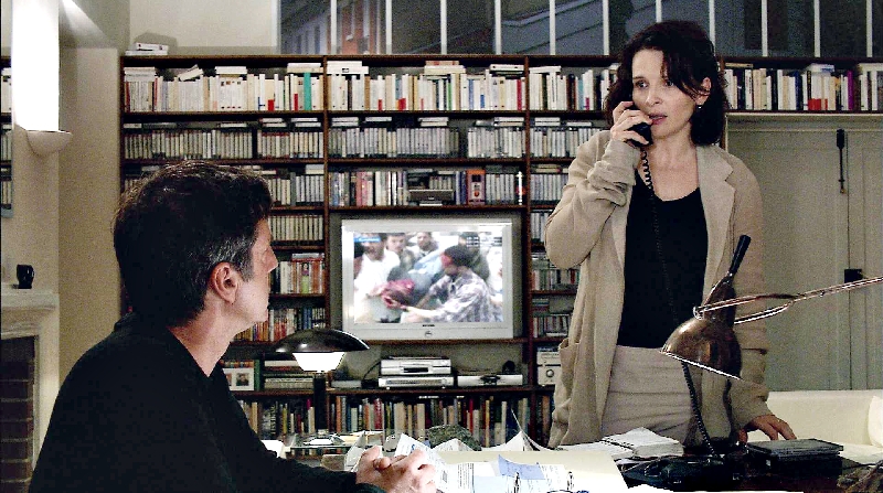 Georges (Daniel Auteuil) e sua esposa Anne (Juliette Binoche): invasão de privacidade | Divulgação