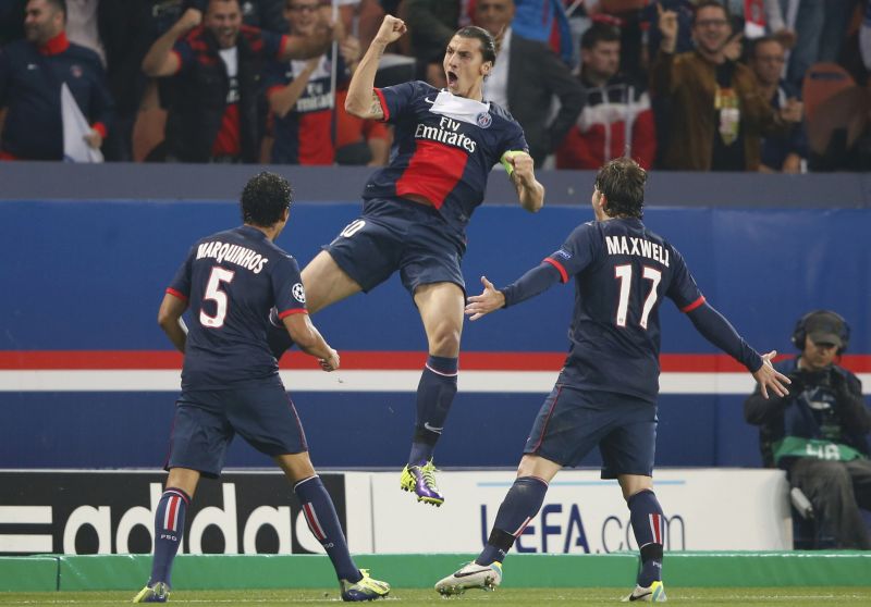Ibrahimovic comemora com os brasileiros Marquinhos e Maxwell gol do PSG sobre o Benfica | Charles Platiau / Reuters