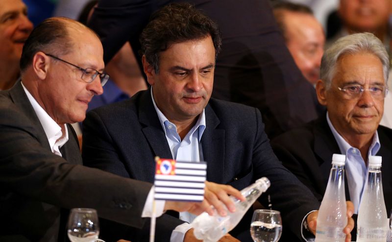 Aécio Neves entre Alckmin e FHC: defesa da candidatura em evento público | Jorge Araújo/Folhapress