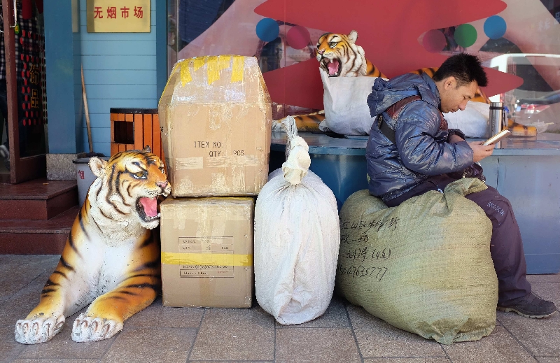 Vendedor em um mercado público de Beijing: observadores esperam que a iniciativa privada ganhe espaço na economia chinesa, ampliando a demanda | Jason Lee/Reuters