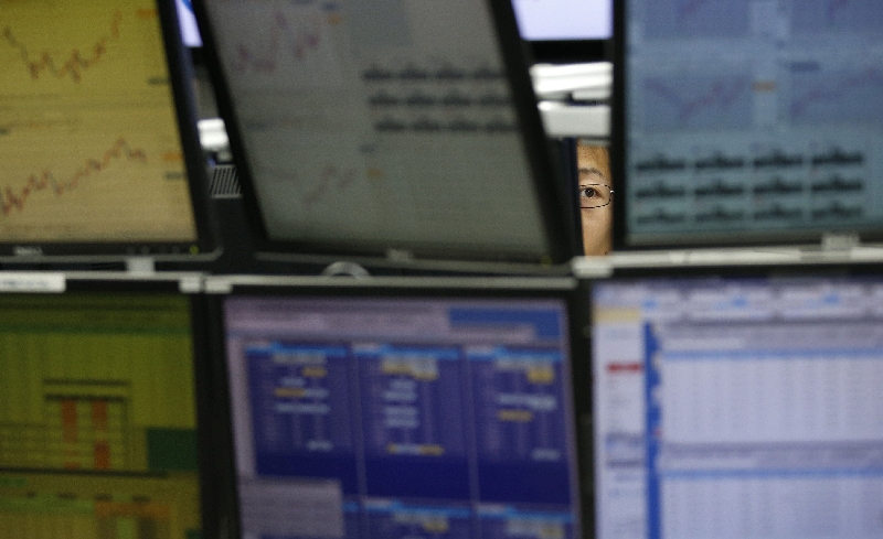 Operador de uma corretora de câmbio em Tóquio: ontem, os mercados emergentes foram castigados pelo terceiro dia consecutivo. | Toru Hanai/Reuters