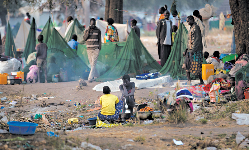 Refugiados que escaparam da luta entre o governo e as forças rebeldes no Sudão do Sul | Ben Curtis/Associated Press